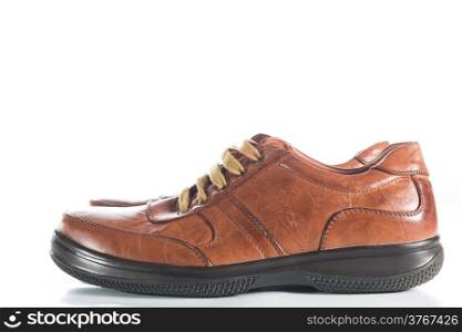 Brown leather shoes on a white background