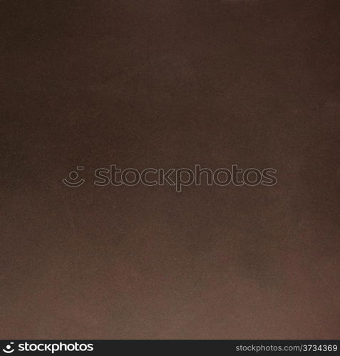 Brown leather texture closeup background.