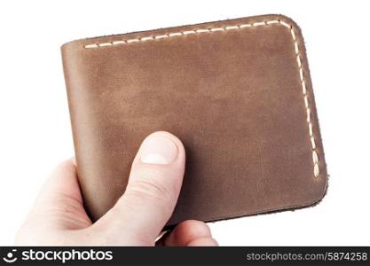 brown leather wallet in hand isolated on white background