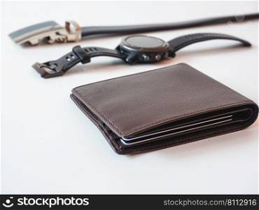 Brown leather wallet on white background.