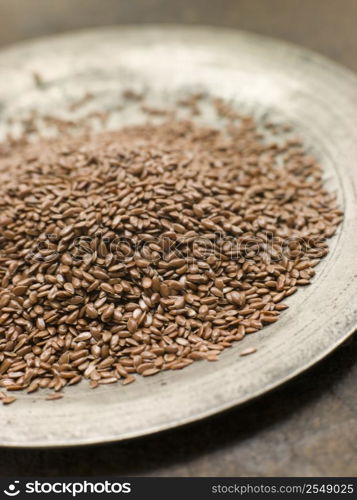 Brown Linseed on a Pewter Plate