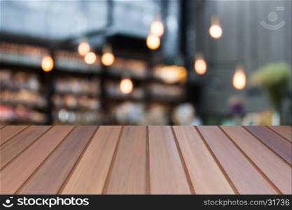 Brown luxury top wooden with blurred cafe background. product display template