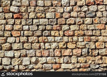 brown masonry stone wall Spain traditional ancient construction