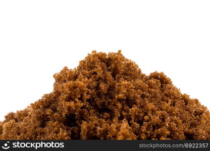 brown muscovado sugar isolated on white background