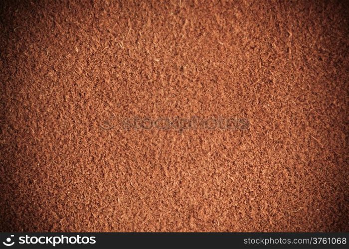 Brown natural leather texture closeup grunge background, skin design abstract pattern.
