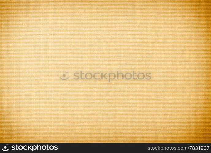 Brown or beige background texture backdrop of close-up macro of striped textile