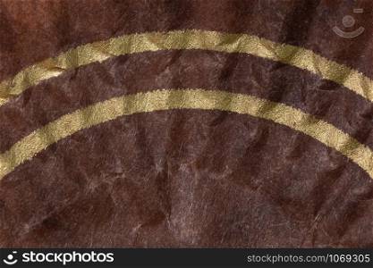 Brown paper background with yellow stripes