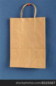 Brown paper bag on a blue background