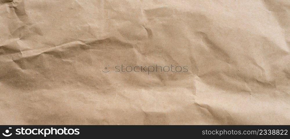 Brown paper crumpled texture and background with space.