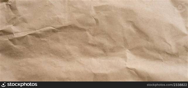 Brown paper crumpled texture and background with space.