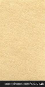 Brown paper texture background - vertical. Grunge brown paper texture useful as a background - vertical