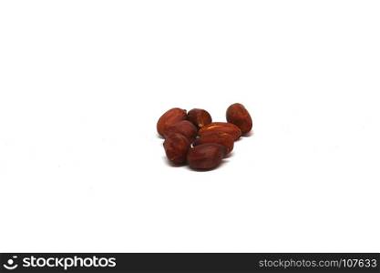 Brown peanuts isolated on white background. Brown peanuts isolated on white background.