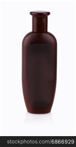Brown plastic bottle with shower gel on white background