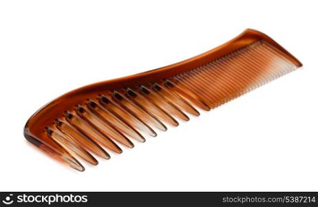 Brown plastic hair comb isolated on white