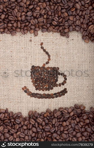 Brown roasted coffee beans. Shot in a studio