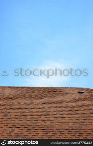 brown roof and blue sky
