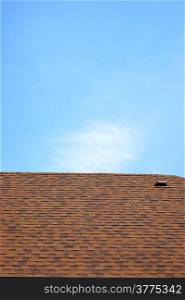 brown roof and blue sky