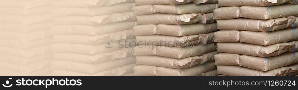 Brown sacks store in industrial warehouse. Background with copy space