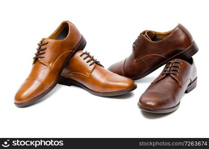 Brown shoes isolated on white background. The brown shoes isolated on white background