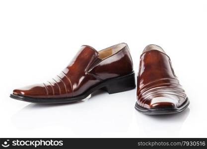 brown shoes pair. Fashion concept with male shoes on white