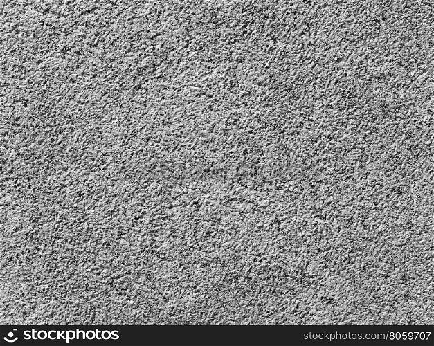 Brown stone wall background in black and white. Brown stone wall useful as a background in black and white