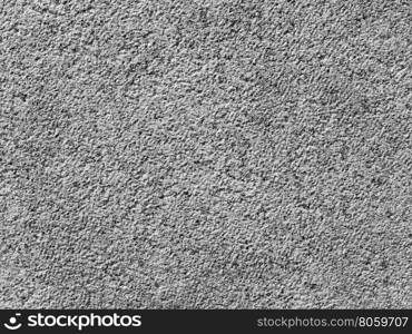 Brown stone wall background in black and white. Brown stone wall useful as a background in black and white