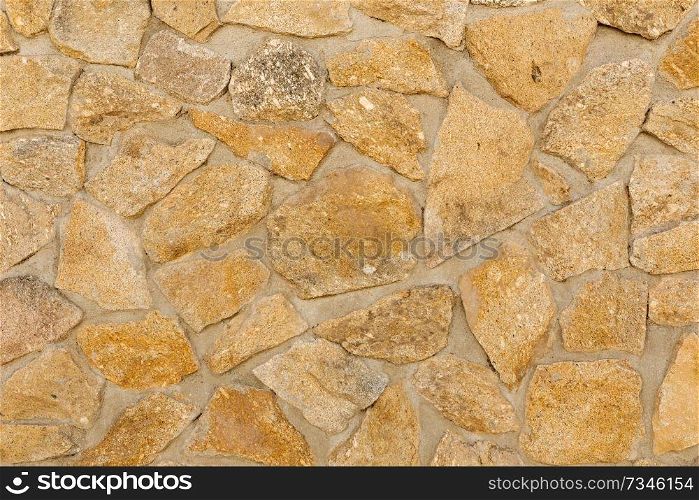 Brown stone wall to use as wallpaper