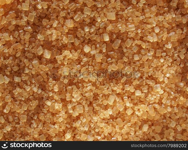 Brown sugar background. Raw brown sugar from sugar cane useful as a background