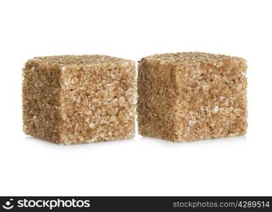 Brown sugar cubes, isolated on white background