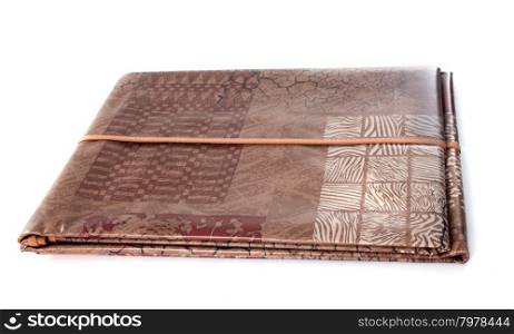 brown tablecloth in front of white background