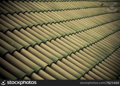 Brown tiles roof texture architecture background seamless pattern, detail of house close up