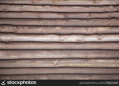 brown varnished planks on outside of barn on farm