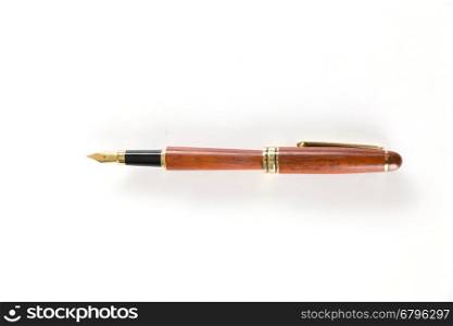 brown vintage fountain pen on white background