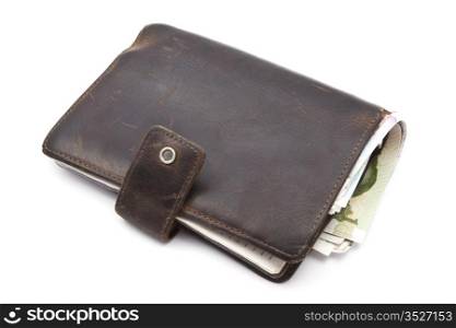 Brown wallet with currency closeup on white background