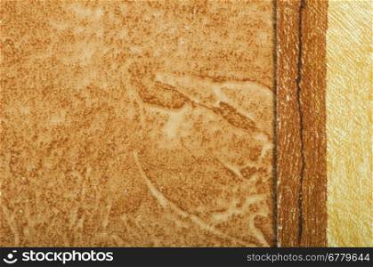 Brown wallpaper texture. Close up part of wallpaper