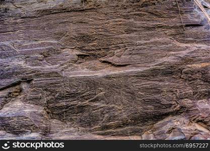 Brown weathered rock background. Brown weathered rock background. Stone surface background. Old rock texture. Stone texture.