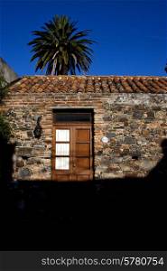 brown wood old door in the centre of colonia del sacramento uruguay