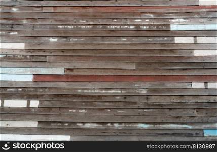 Brown wooden wall texture background. Empty old wood plank surface texture background. Timber wooden wall with brown, blue, and white colors. Exterior design. Wooden wall with nails. Weathered wood.