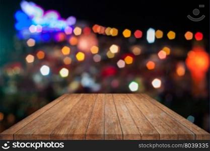 Brown wooden with abstract blurred bokeh lights, stock photo