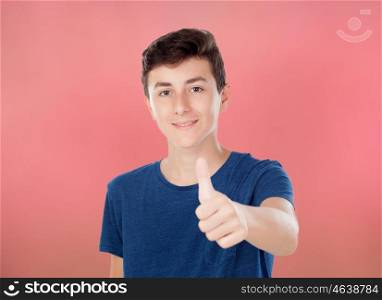 Brown young caucasian boy on red background