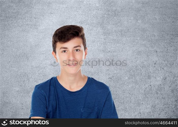 Brown young caucasian guy on blue background