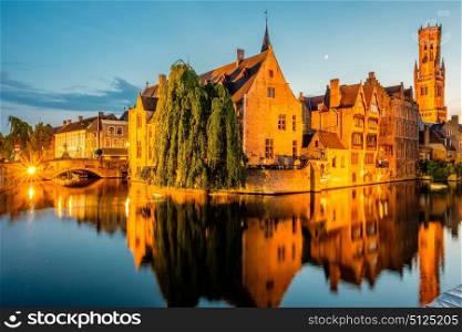 Bruges (Brugge) cityscape with water canal at night, Flanders, Belgium