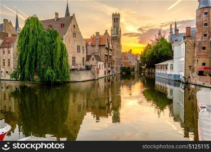 Bruges (Brugge) cityscape with water canal at sunset, Flanders, Belgium
