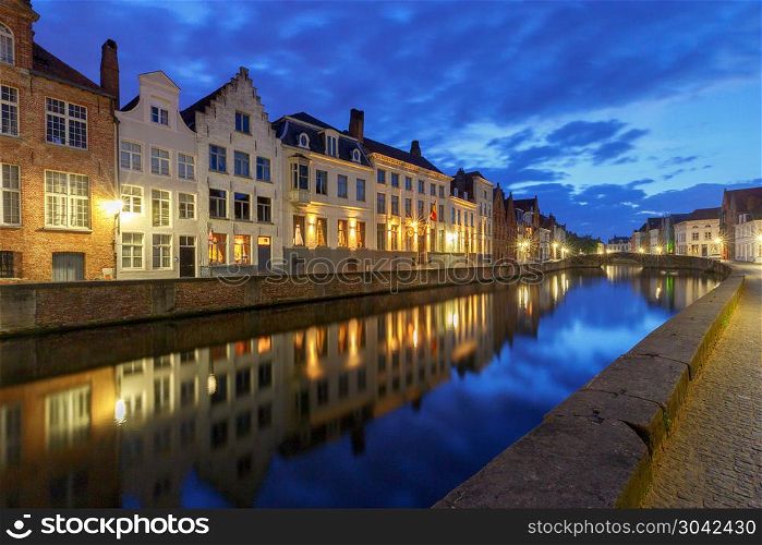 Bruges. Canal Spiegel Rei.. View of the Spiegel Rey canal and facades of old medieval houses at sunset. Brugge. Belgium.