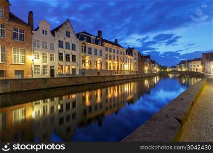 Bruges. Canal Spiegel Rei.. View of the Spiegel Rey canal and facades of old medieval houses at sunset. Brugge. Belgium.