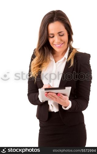 Brunette beautiful business woman holding new electronic tablet touch pad computer pc and thinking about idea, isolated on a white background