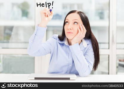 Brunette business woman with notebook working in home office