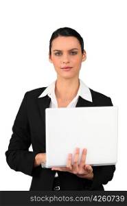 Brunette businesswoman with laptop