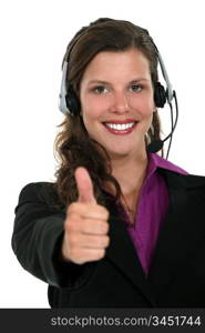 Brunette call-center worker giving the thumbs-up