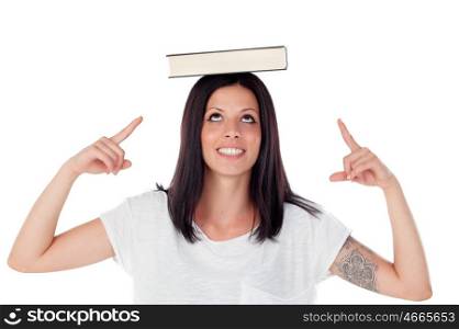 Brunette cool girl balancing a book on the head - isolated on white background